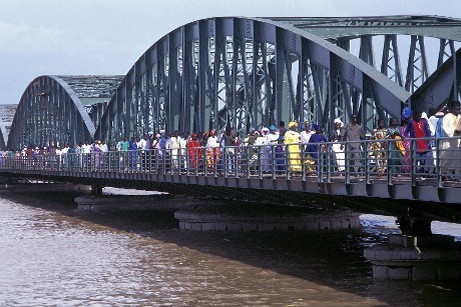 People Crossing Bridge